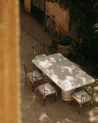 Aveline Chair, powder-coated iron with linen seat cushion, lifestyle